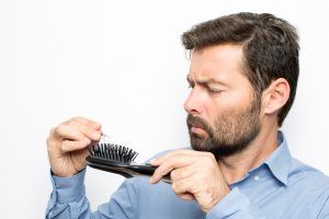 picking hair off comb