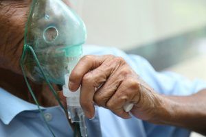 man with enhanced oxygen device