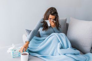 woman with flu like symptoms