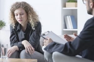 therapist working with patient